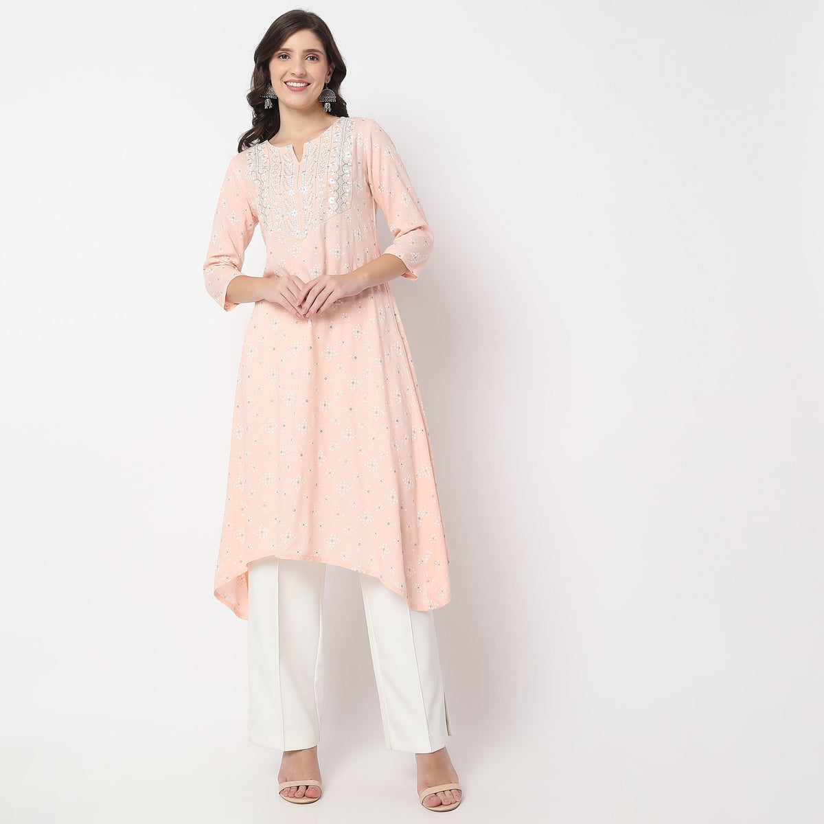 Women Wearing Flare Fit Embroidered Kurta