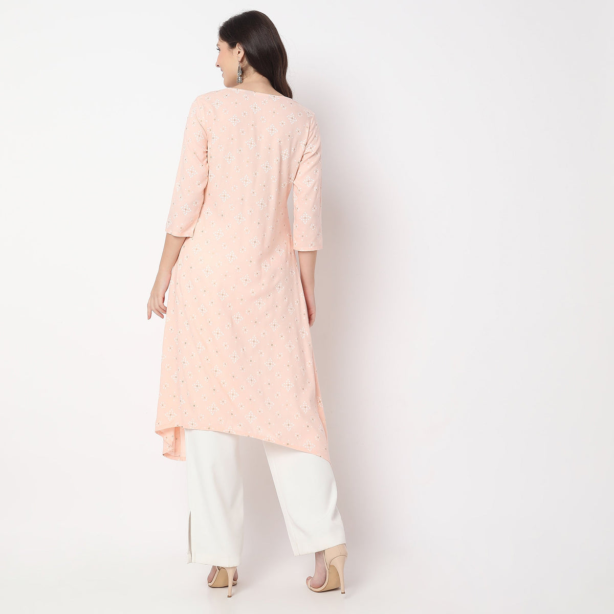 Women Wearing Flare Fit Embroidered Kurta