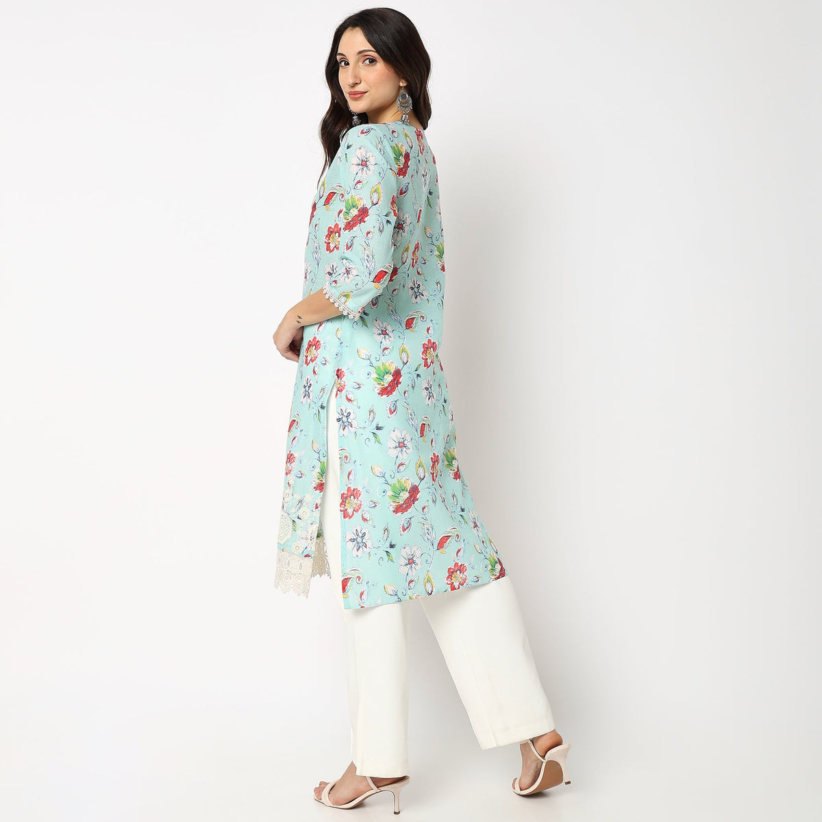 Women Wearing Straight Fit Solid Kurta