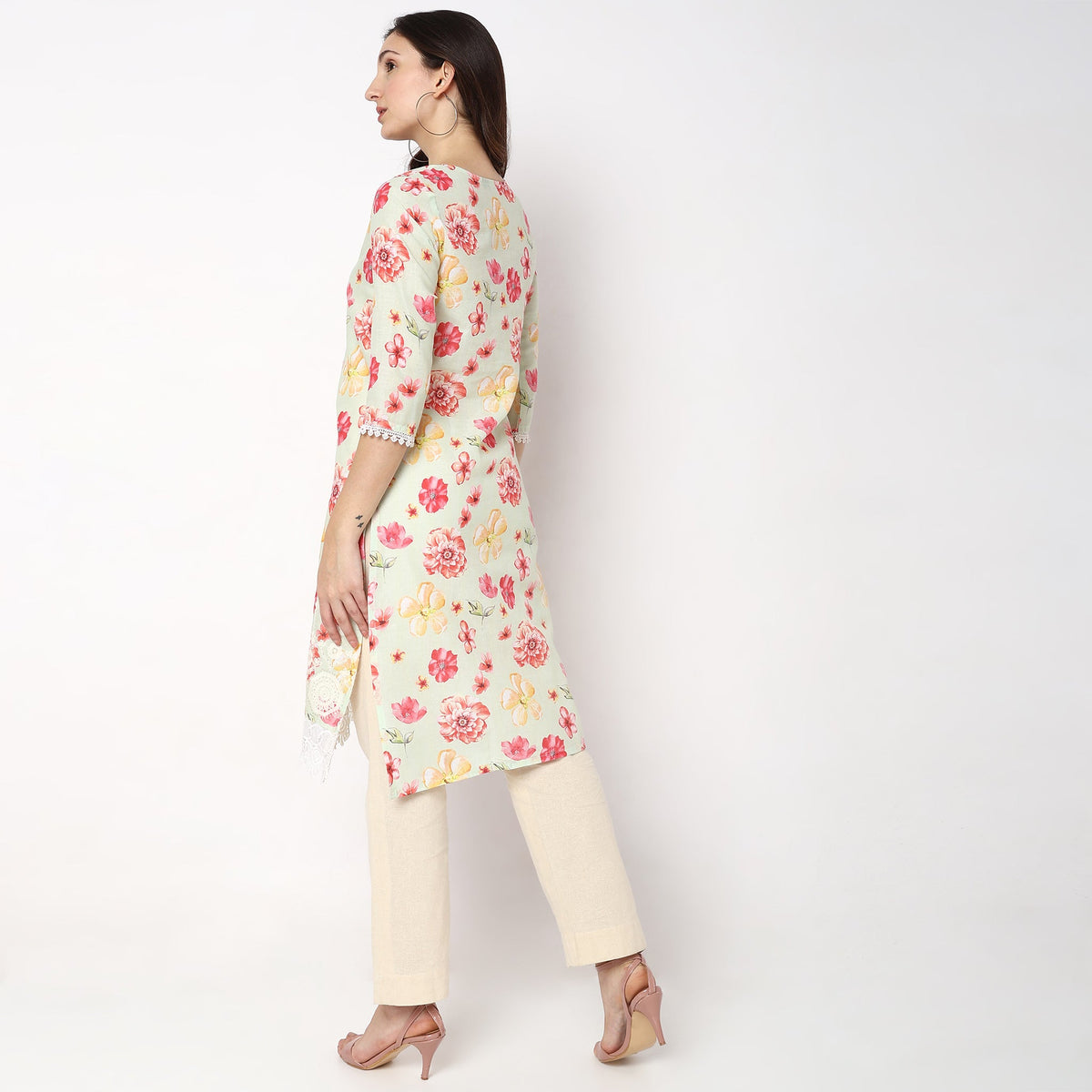 Women Wearing Straight Fit Printed Kurta