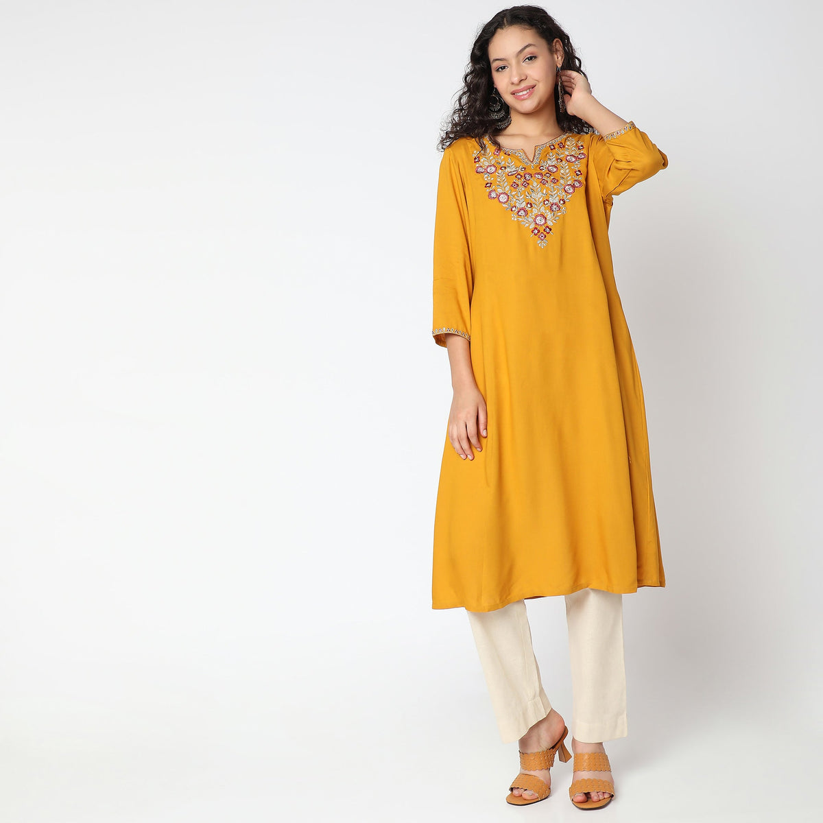 Women Wearing Flare Fit Embroidered Kurta