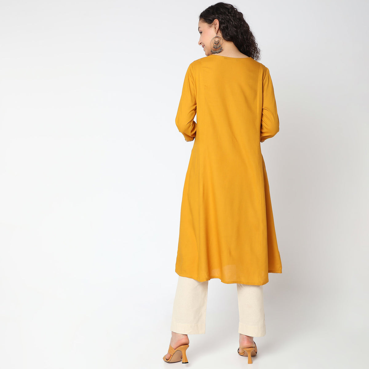 Women Wearing Flare Fit Embroidered Kurta