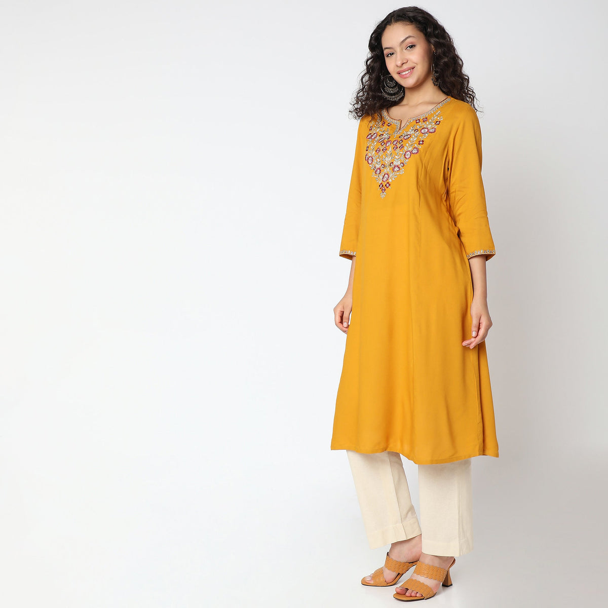 Women Wearing Flare Fit Embroidered Kurta