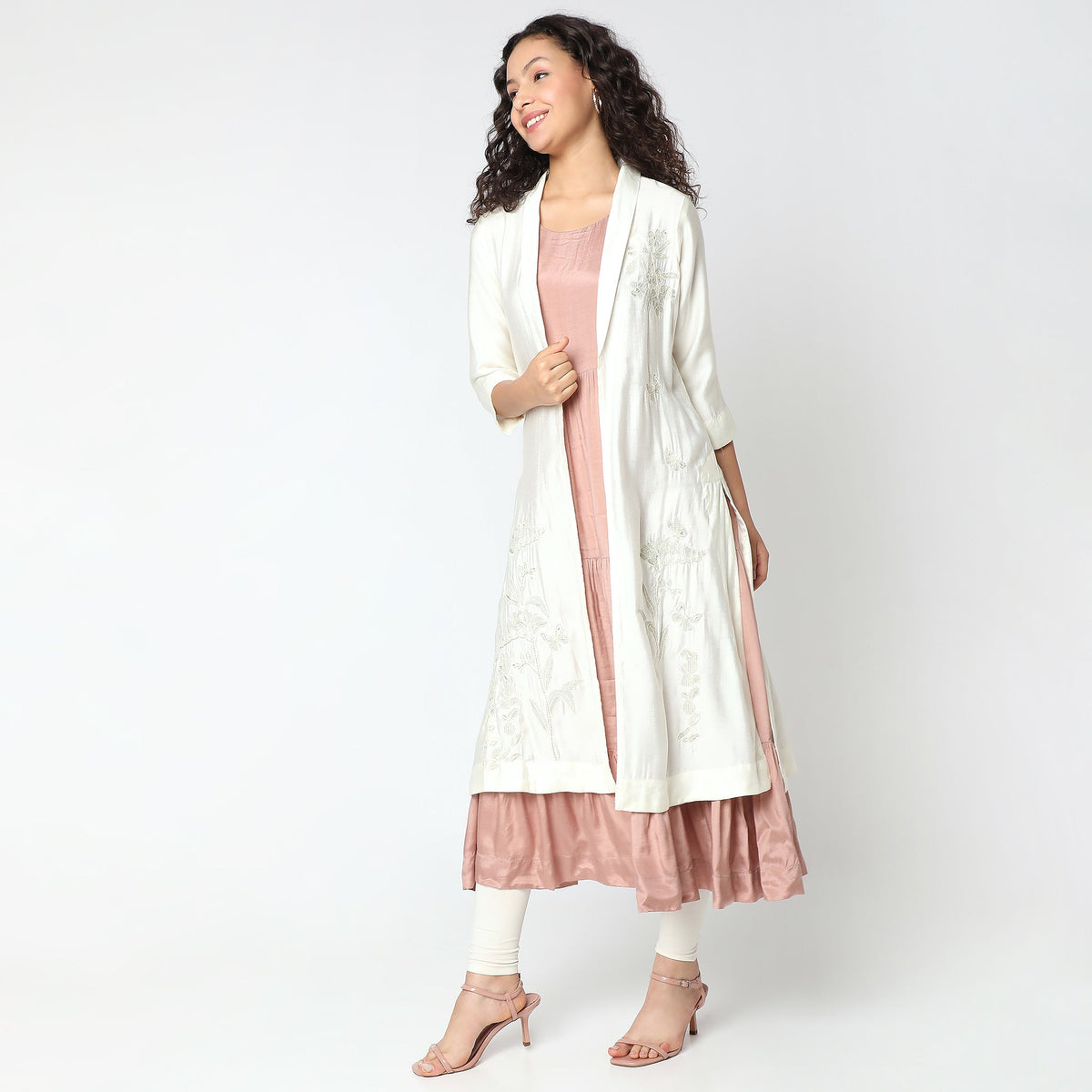 Women Wearing Regular Fit Embroidered Kurta